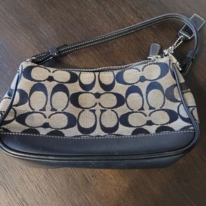 Small navy blue Coach purse